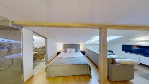 Tempat tidur dalam kamar di Apartmán Pod Kalváriou