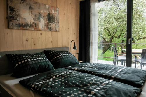 Ένα ή περισσότερα κρεβάτια σε δωμάτιο στο Ferienhaus erholzeit.