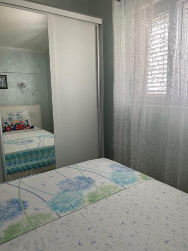 Una cama o camas en una habitación de Villa Mare Apartments