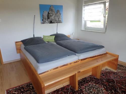 Postel nebo postele na pokoji v ubytování Ulmer Münster Blick