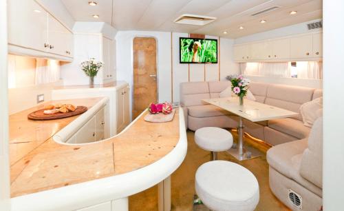 a kitchen and living room of an rv at Sunseeker Renegade 60 Ft in Weymouth