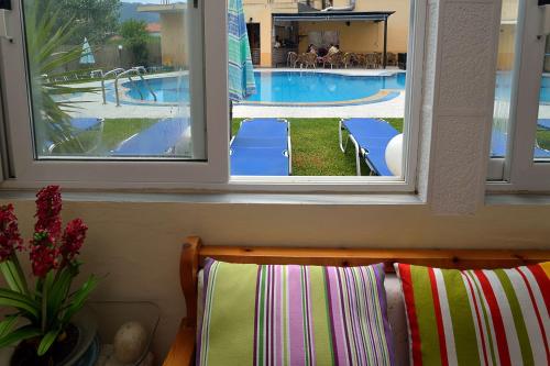 Bazén v ubytování Eleni Apartments nebo v jeho okolí