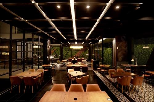 Restoranas ar kita vieta pavalgyti apgyvendinimo įstaigoje Awann Sewu Boutique Hotel and Suite Semarang