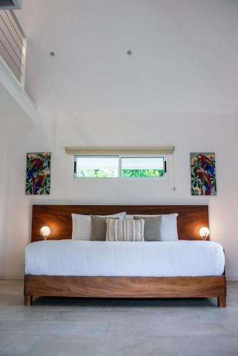 Ένα ή περισσότερα κρεβάτια σε δωμάτιο στο Aves Resort Montezuma