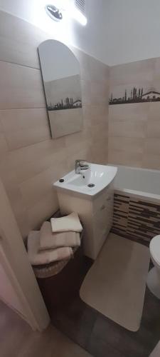 Kúpeľňa v ubytovaní Könyvkuckó Apartman