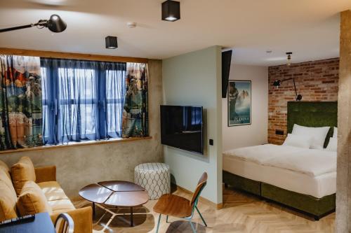 Postel nebo postele na pokoji v ubytování ONE66 Hotel