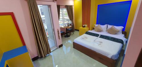 Ένα ή περισσότερα κρεβάτια σε δωμάτιο στο Pheng Chenda Hotel