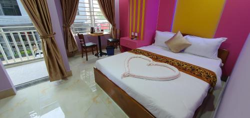 Ένα ή περισσότερα κρεβάτια σε δωμάτιο στο Pheng Chenda Hotel