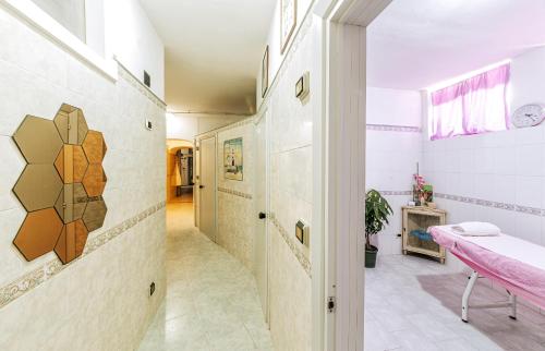 Postel nebo postele na pokoji v ubytování Hotel Galidon Wellness Park & SPA