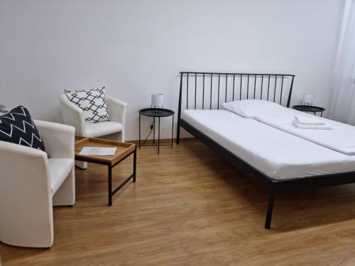 Postel nebo postele na pokoji v ubytování Stará Pošta