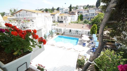 a view of a balcony with a swimming pool at Ascot Hotel Büyükada in Buyukada