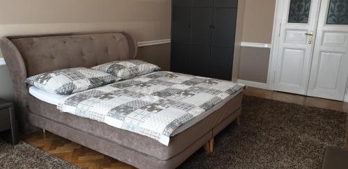 Postel nebo postele na pokoji v ubytování Deluxe apartment Slovenská