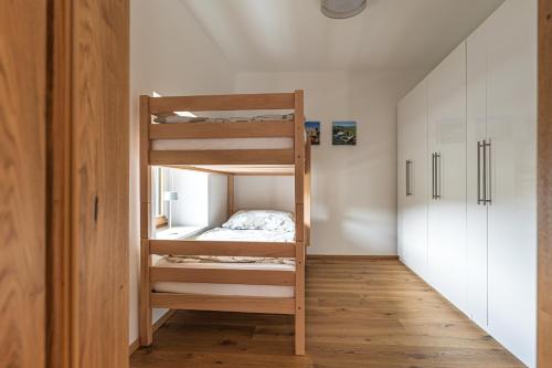 Una cama o camas cuchetas en una habitación  de Forsthaus Gray 4