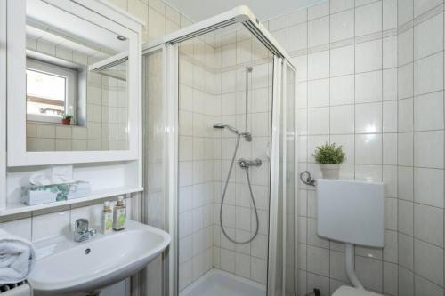 Ванная комната в Schönes Ferienhaus mit Garten