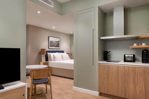 Voodi või voodid majutusasutuse The Lincoln Suites toas