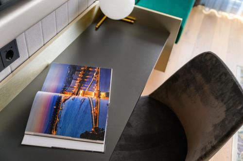 a picture of the eiffel tower on a shelf at Emerald Downtown Luxury Suites by Continental Group in Budapest