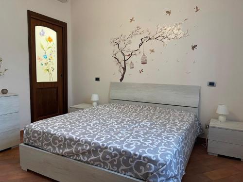 A bed or beds in a room at 34 Arena House
