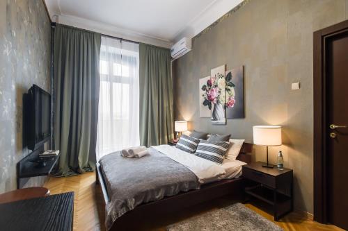 Postel nebo postele na pokoji v ubytování GMApartments 4 rooms flat near Kremlin