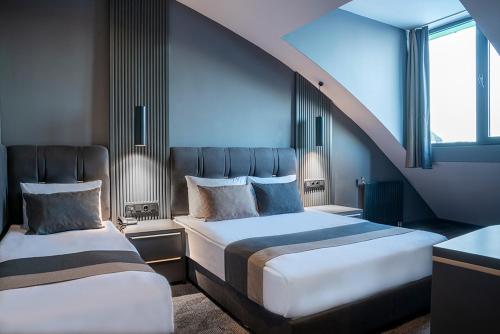 Кровать или кровати в номере Trendlife Hotels Uludağ ALL INCLUSIVE