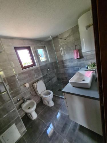 Vannituba majutusasutuses The Lake Breeze Bay