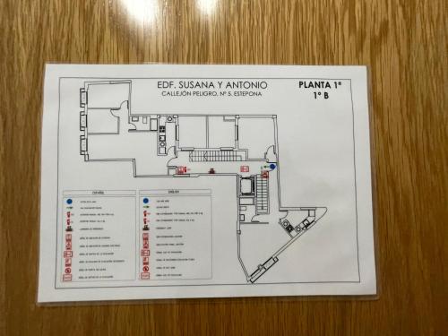 a drawing of a floor plan of a pharmacy at Royal Suites Estepona by Croma in Estepona