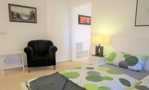 Penthouse Wolkenstein großzügige Maisonette auf 155 qm mit Whirlpool, Klima & Kaminにあるベッド