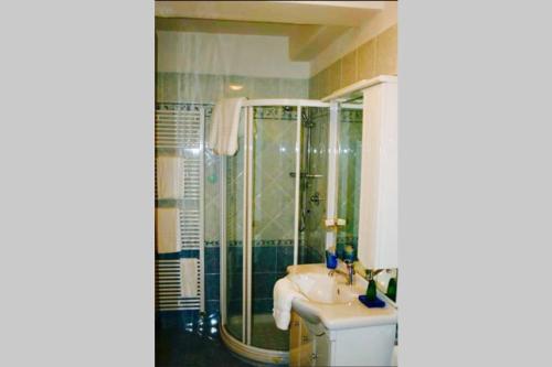 a bathroom with a shower and a sink at Appartamento con vista Zattere in Venice