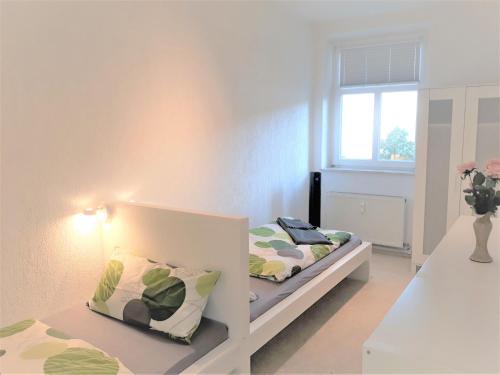 Penthouse Wolkenstein großzügige Maisonette auf 155 qm mit Whirlpool, Klima & Kaminにあるベッド