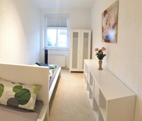 Penthouse Wolkenstein großzügige Maisonette auf 155 qm mit Whirlpool, Klima & Kaminにあるベッド