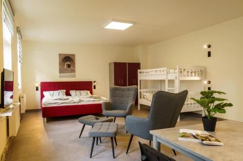 Postel nebo postele na pokoji v ubytování Hotel und Hostel Gleisbett