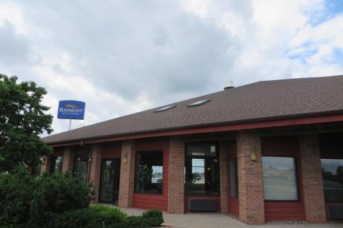 a building with a sign on top of it at Baymont by Wyndham Boone in Boone