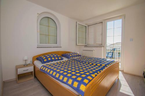 Postel nebo postele na pokoji v ubytování Apartments Relax near Opatija