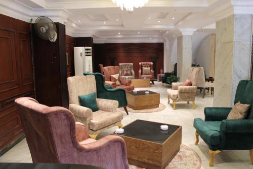 Posezení v ubytování Maxim Hotel