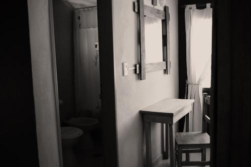 Vonios kambarys apgyvendinimo įstaigoje El Alamo