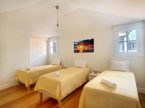 Een bed of bedden in een kamer bij Casa Conceição by LovelyStay
