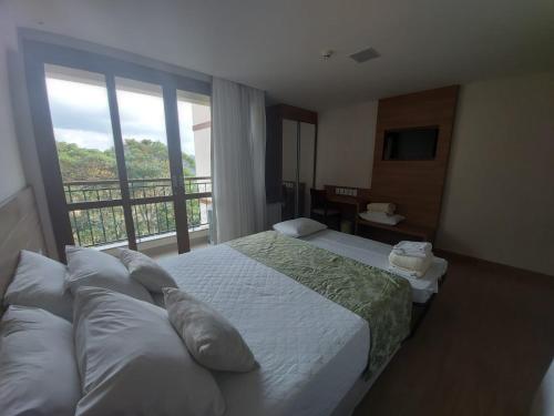 Säng eller sängar i ett rum på Vista Azul Suites