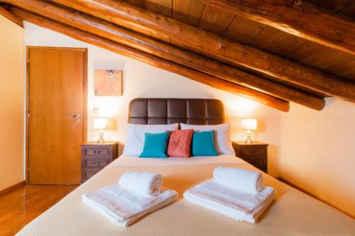 Una cama o camas en una habitación de Agathis Home