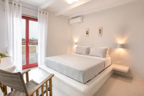 Postel nebo postele na pokoji v ubytování Marathi Mykonos