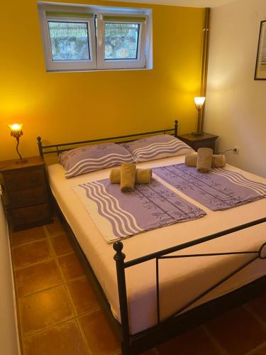 Ένα ή περισσότερα κρεβάτια σε δωμάτιο στο Holiday House Krk