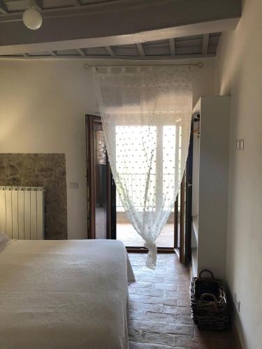 Ένα ή περισσότερα κρεβάτια σε δωμάτιο στο B&B Le Principesse