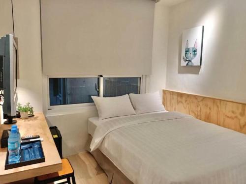 Postel nebo postele na pokoji v ubytování Home Rest Hotel 2