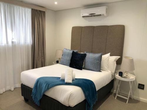 Postel nebo postele na pokoji v ubytování Pebble Beach Sibaya Apartment 238