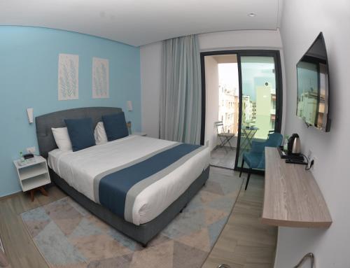 Postel nebo postele na pokoji v ubytování Gardenia Boutique Hotel