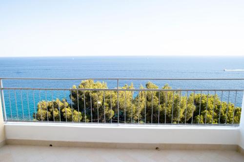a balcony with a view of the ocean at Marconi 442 in Sanremo
