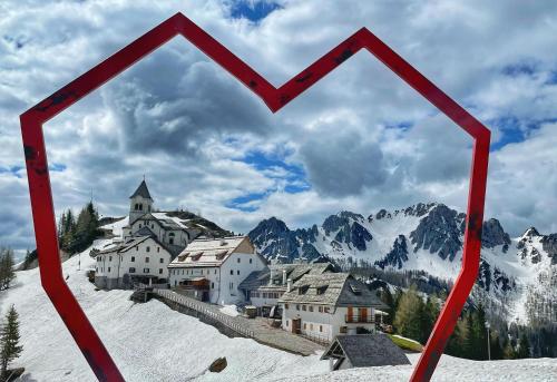 a heart shaped picture of a village in the snow at STARLING Apartment Nassfeld in Hermagor