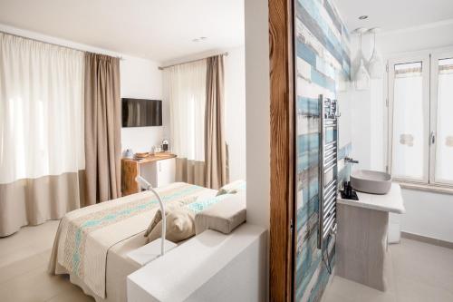 Ένα μπάνιο στο Assaje' Luxury Rooms
