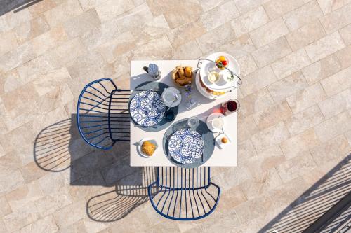 an overhead view of a table with plates of food at VistaLago Torbole in Nago-Torbole
