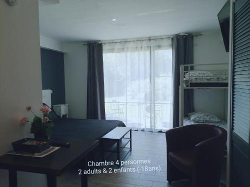 Ένα ή περισσότερα κρεβάτια σε δωμάτιο στο Chambres d'hotes Grace