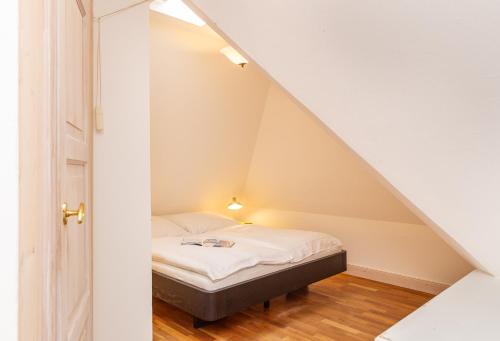 Ein Bett oder Betten in einem Zimmer der Unterkunft Friesenglück