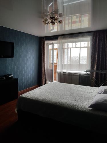 Uma cama ou camas num quarto em Apartment at Engelsa 3/1